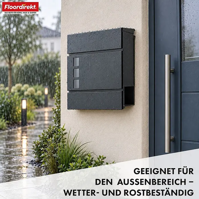 Floordirekt Briefkasten Jules mit Zeitungsfach Anthrazit -  - Ein wetterbeständiger, anthrazitfarbener Briefkasten an einer Hauswand bei Regen.