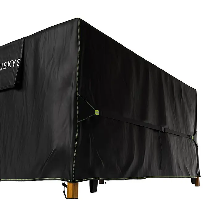 Gartenmöbel Abdeckplane CoverSafe Pro 150x90x75 cm -  - Schwarze Outdoor-Möbelabdeckung mit grünen Nähten und Befestigungsriemen, schützt ein rechteckiges Möbelstück.