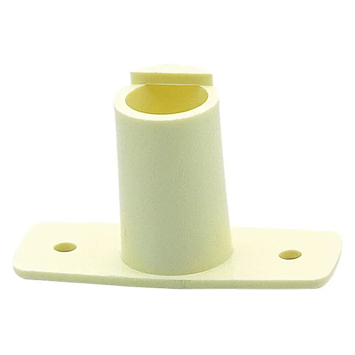 Dollenhalter - Durchmesser: 18 mm, Nylon, Weiß - Eine Nahaufnahme eines cremefarbenen Schaumstoff-Objekts mit zylindrischer Form auf einer rechteckigen Basis mit Löchern.
