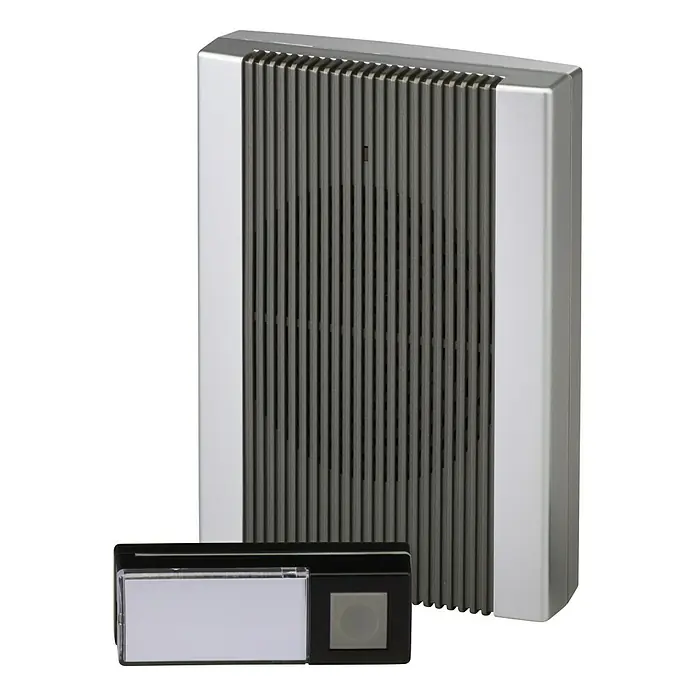 Heidemann Funk-Gong-Set HX Sound - Reichweite ca.: 200 m, 70 dB - 97 dB, Batteriebetrieben, IP55 - Das Bild zeigt eine stilvolle, silberfarbene Funkklingel mit einem modernen Design, ideal für jedes Zuhause.