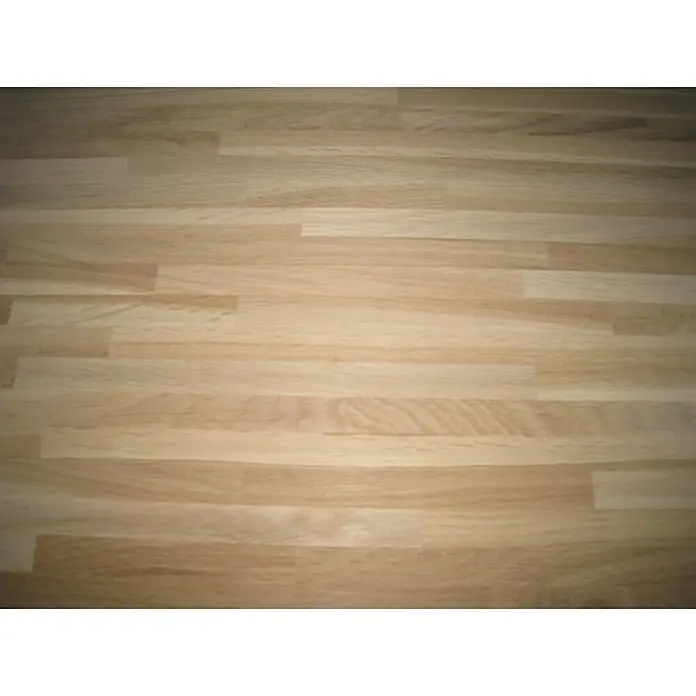 Exclusivholz Encimera - Roble, 260 x 63,5 x 2,6 cm - Primer plano de un panel de madera clara con una veta interesante, ideal para muebles o encimeras.
