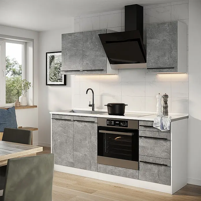 Singleküche R-Line 180 cm Beton Art.-Nr. 67050 -  - Moderne Küche mit grauen Betonoptik-Schränken, schwarzer Dunstabzugshaube, Spüle und integriertem Ofen.