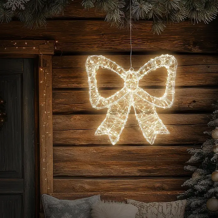 ECD Germany LED Weihnachtsschleife, Weihnachtsdeko Innen & Außen 48x46 cm -  - Weiße LED-Lichtschleifendekoration an einer rustikalen Holzwand, die eine festliche Atmosphäre schafft.