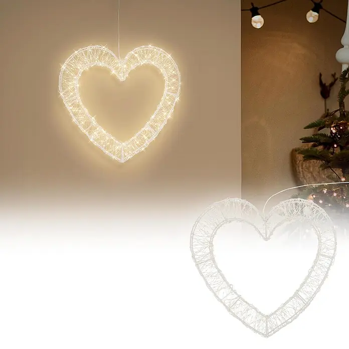 ECD Germany LED Deko Herz Weihnachten Fensterdeko mit Timer -  - Eine beleuchtete herzförmige Dekoration aus weißem Drahtgeflecht mit warmweißen LEDs, beleuchtet und unbeleuchtet in festlicher Umgebung.