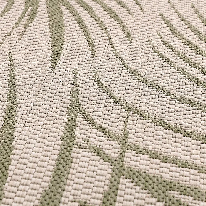 Dekoria Teppich Lineo beige/jungle green 120cm -  - Nahaufnahme eines gewebten Textils in Beige und Grün mit Palmenblattmuster.