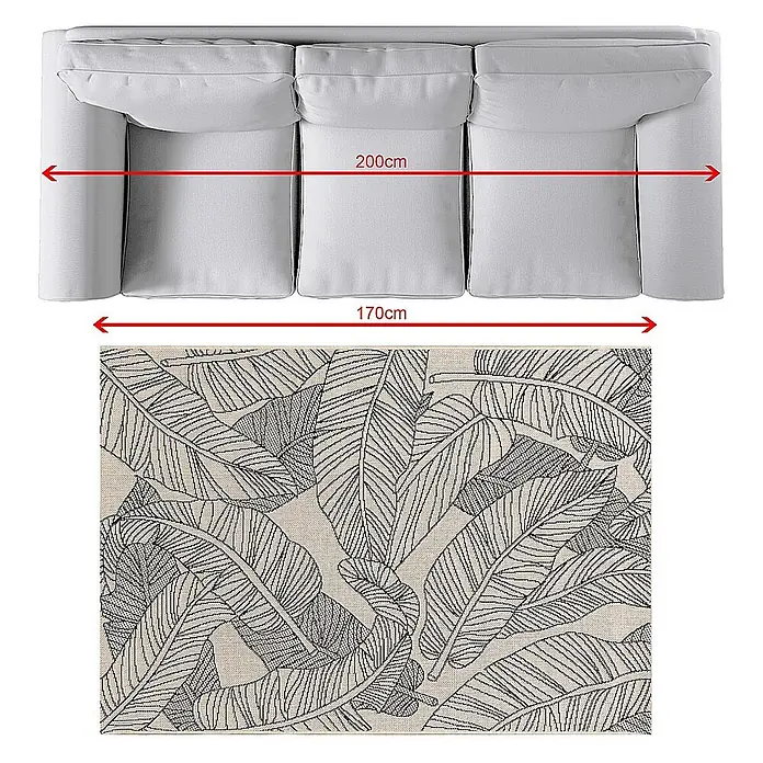Dekoria Teppich Cottage beige/black 120x170cm -  - Aufsicht auf ein hellgraues Sofa (200cm breit) und einen rechteckigen Teppich mit schwarzem Blattmuster (170cm breit) darunter.