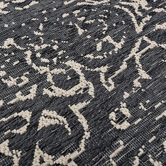 Dekoria Teppich Velvet beige/petrol blue 200x290cm -  - Nahaufnahme eines dunkelgrauen Webteppichs mit beigem, abstraktem Muster.