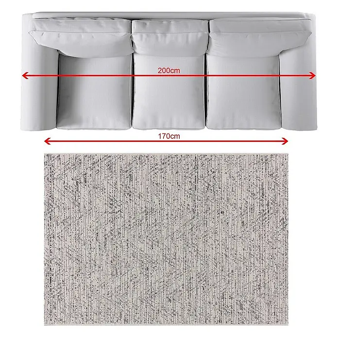 Dekoria Teppich Breeze charcoal/grey 120x170cm -  - Blick von oben auf ein hellgraues 3-Sitzer-Sofa (200cm) und einen rechteckigen, gemusterten Teppich (170cm breit).