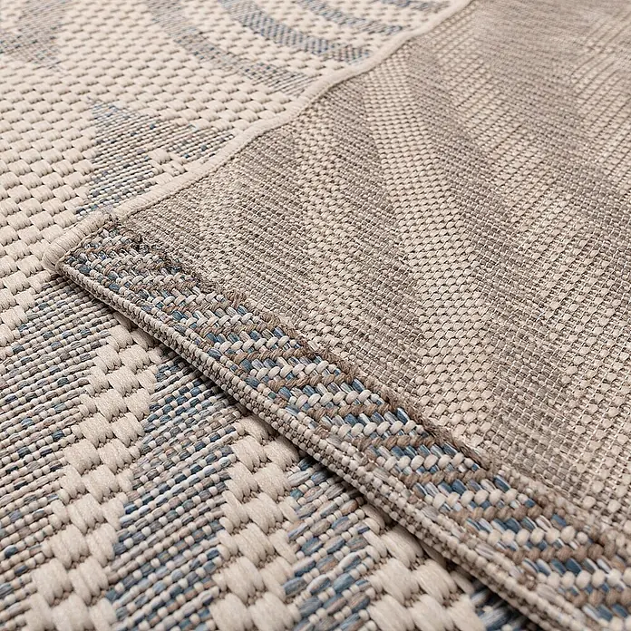 Dekoria Teppich Breeze beige/raw/blue 200x290cm -  - Nahaufnahme eines strapazierfähigen Webteppichs in Beige und Blau, zeigt sein strukturiertes Muster und seine Konstruktion.