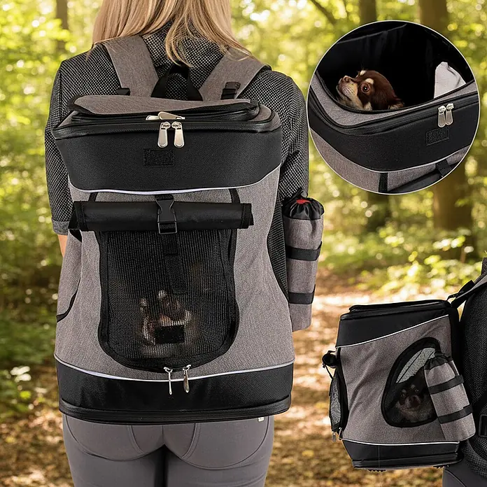 belviona Rucksack für Hunde & Katzen mit Belüftung & Regenschutz, schwarz -  - Grau-schwarzer Haustier-Transportrucksack mit Netzfenstern, der einen kleinen Hund trägt, von einer Person getragen.
