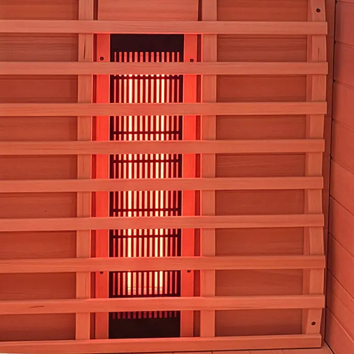 Home Deluxe Infrarotkabine SONORA M M -  - Infrarot-Saunaheizer mit leuchtend rotem Element hinter hellen Holzschutzlamellen.