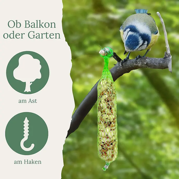 Orni Nusszapfen für Wildvögel 1 Stück 195g -  - Grünes Vogelfutter-Netz mit Nüssen und Samen, von einem Vogel an einem Ast gefressen.
