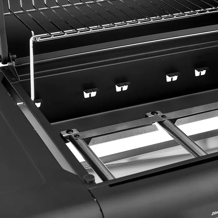 TAINO COMPACT 3+0 Gasgrill Platzsparend Schwarz -  - Schwarzer Gasgrill innen mit Brennerrohren und Warmhalterost.