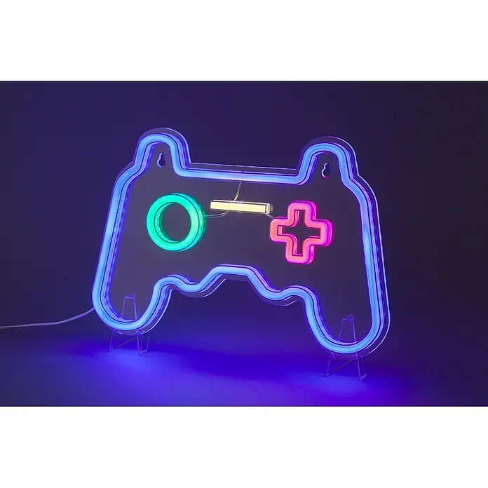 Tween Light LED-Dekoleuchte Gamepad Controller - Transparent, Kunststoff, L x B x H: 1,5 x 32 x 21 cm - Eine Neonleuchte in Form eines Gamecontrollers mit blauen Umrissen, grünem Kreis, gelbem Strich und rosa Pluszeichen, auf transparenten Stützen.