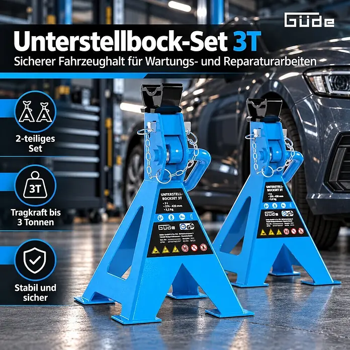 Güde Unterstellbock 3T - Gesamtumfang: 2 -tlg., Blau, Stahl - Ein Set aus zwei blauen Unterstellböcken aus Metall in einer Werkstatt, die ein Fahrzeug abstützen. Sie sind stabil und haben 3 Tonnen Tragkraft.