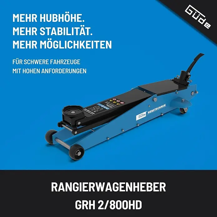 Güde Hydraulischer Rangierwagenheber GRH 2/800HD - Hubhöhe: 145 mm - 800 mm - Ein robuster blauer hydraulischer Rangierwagenheber für Fahrzeuge, mit schwarzen Rädern und Griff.