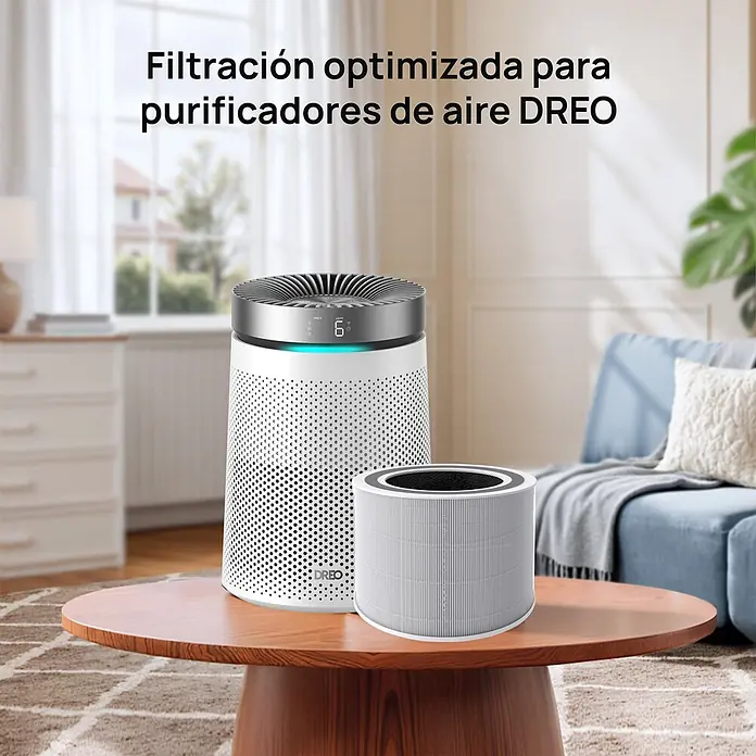 Filtro HEPA DREO AP606 - Específico para: Purificador Dreo AP606 - Un purificador de aire DREO blanco con tapa plateada junto a su filtro de repuesto gris, sobre una mesa de madera en una sala.
