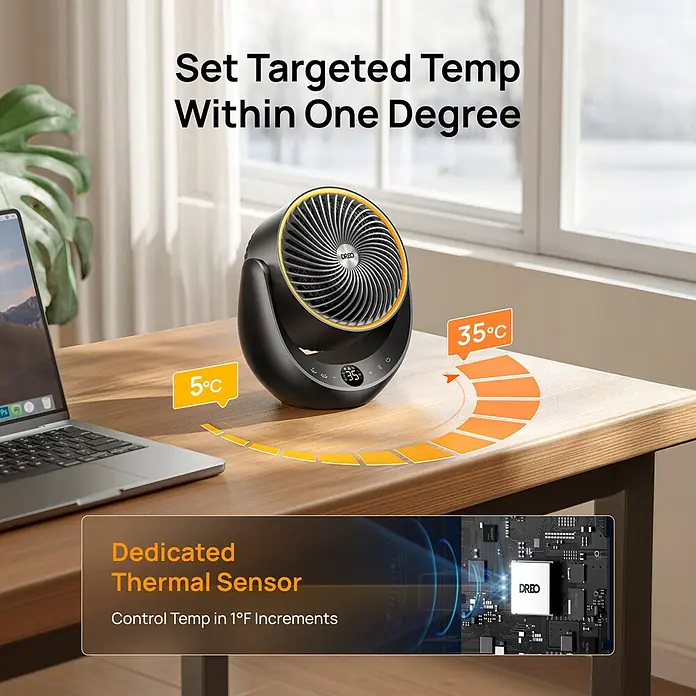 Dreo Calefactor cerámico 715 - 2.000 W, Negro, 19,3 x 28,9 x 33,3 cm - Calefactor negro con anillo dorado sobre escritorio de madera, mostrando 35°C e indicando control preciso de temperatura.