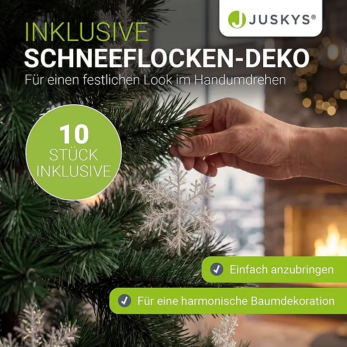 Weihnachtsbaum Norvi - L -  - Eine Hand hängt eine funkelnde silberne Schneeflocken-Deko an einen grünen Kunstweihnachtsbaum. 10 Stück für festliche Dekoration.