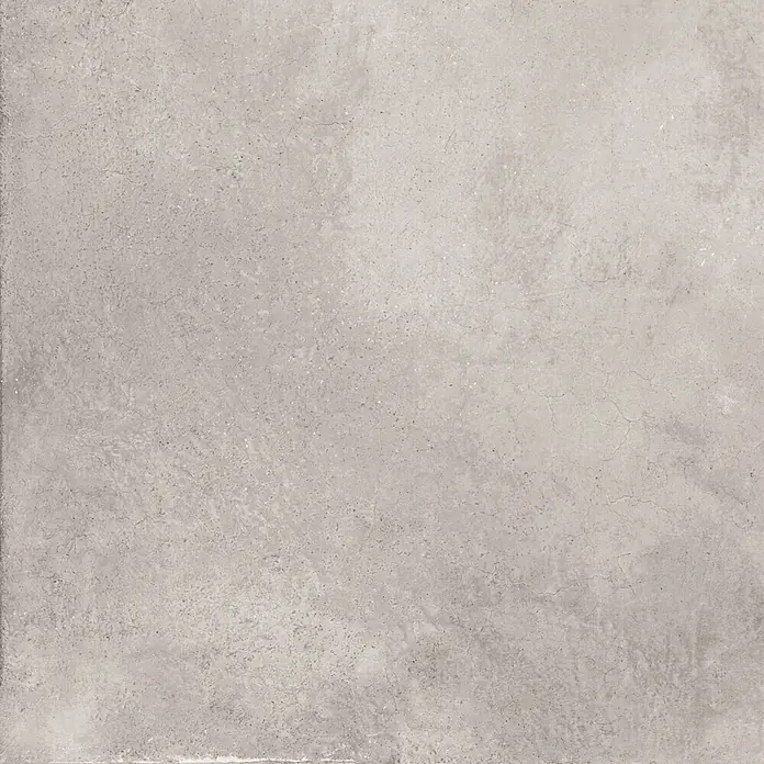 Feinsteinzeug in gewachster hellgrauer Betonoptik 60x60 - Ital. Fliesen -  - Hellgraue Betonoberfläche mit feiner Textur und Rissen, ideal für moderne Böden oder Wände.