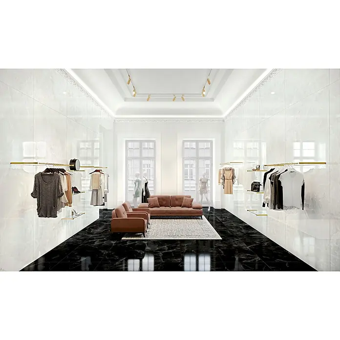 Feinsteinzeug in glänzender schwarzer Marmoroptik 30x60 - Ital. Fliesen -  - Luxuriöse weiße Wandfliesen und schwarze Bodenfliesen gestalten ein elegantes Ladeninterieur mit Kleiderständern und Sitzgelegenheiten.