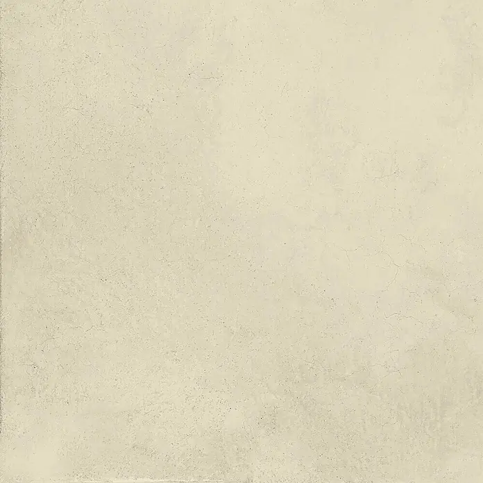 Feinsteinzeug in gewachster elfenbeinfarbener Betonoptik 60x60 -  - Hellbeige Fliese in Betonoptik mit feiner Textur und leichten Rissen.