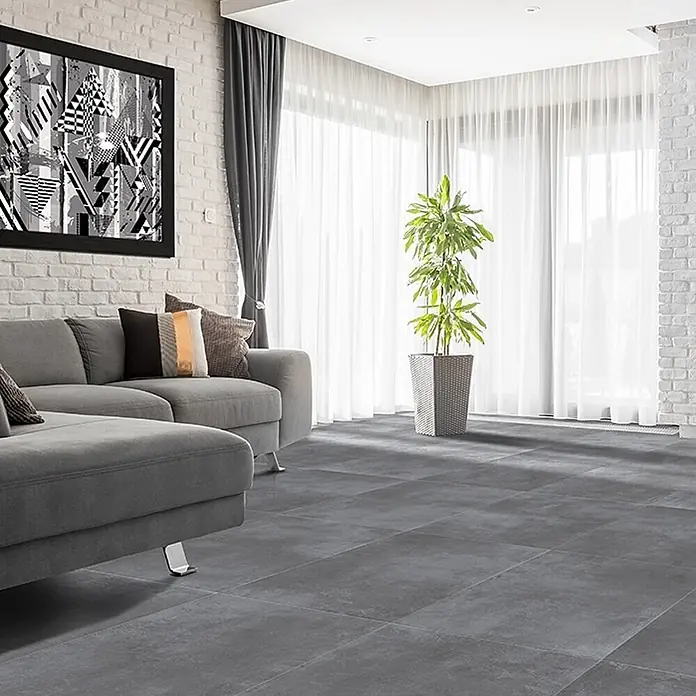 Feinsteinzeug in dunkelgrauer Harzoptik 30x60 - Italienische Fliesen -  - Dunkelgraue Bodenfliesen bedecken den Boden eines modernen Wohnzimmers und bieten eine elegante, robuste Oberfläche.