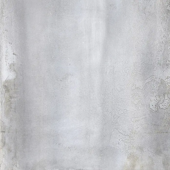 Feinsteinzeug in oxidierter grauer Metalloptik 60x60 - Italienische Fliesen -  - Helle graue Betontextur mit subtilen Abnutzungsspuren für einen industriellen, verwitterten Look.