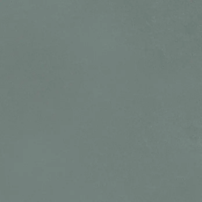 Feinsteinzeug in farbiger salbeigrüner Betonoptik 60x60 - Ital. Fliesen -  - Eine Nahaufnahme einer gedeckten salbeigrünen Oberfläche mit einer subtilen, weichen Textur.