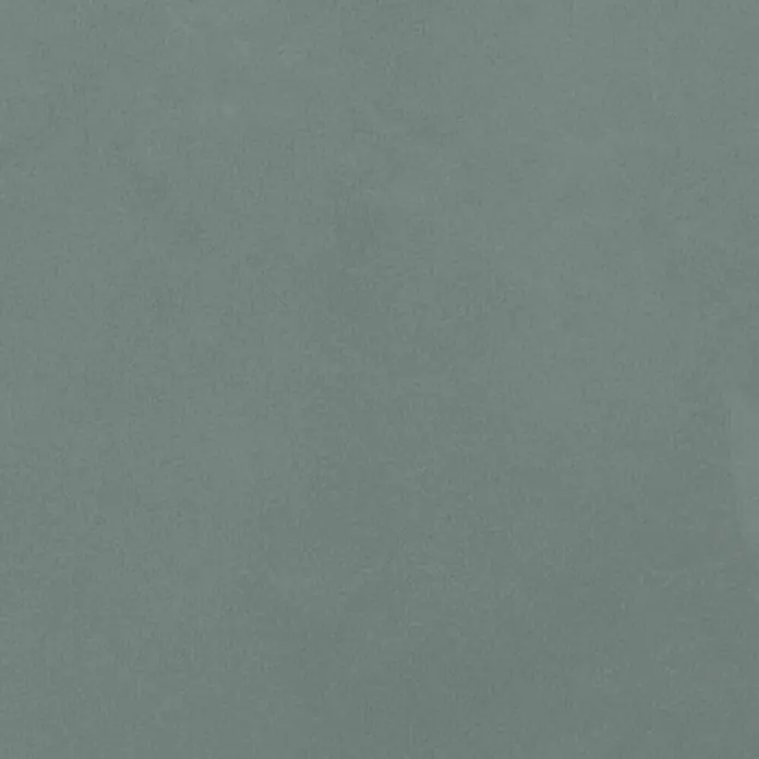 Feinsteinzeug in farbiger salbeigrüner Betonoptik 60x60 - Ital. Fliesen -  - Strukturierte grünlich-graue Materialprobe.