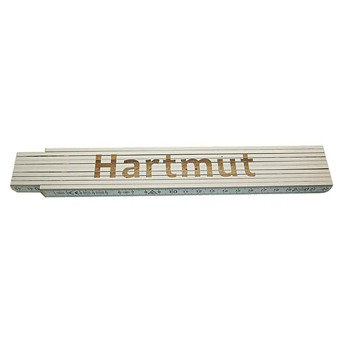 Zollstock - Aufdruck: Hartmut, 2 m - Ein Zollstock aus Holz mit der Aufschrift "Hartmut", ein nützliches Werkzeug für präzise Messungen bei Bauprojekten.