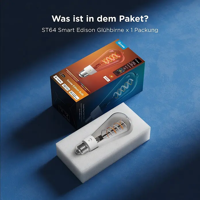 Govee Smart-LED-Lampe Edison Bulb - E27, Dimmbar, RGBW, 500 lm - Govee ST64 Smart Edison Glühbirne, ausgepackt und in der Verpackung, mit klarem Glas und bernsteinfarbenem Glühfaden.