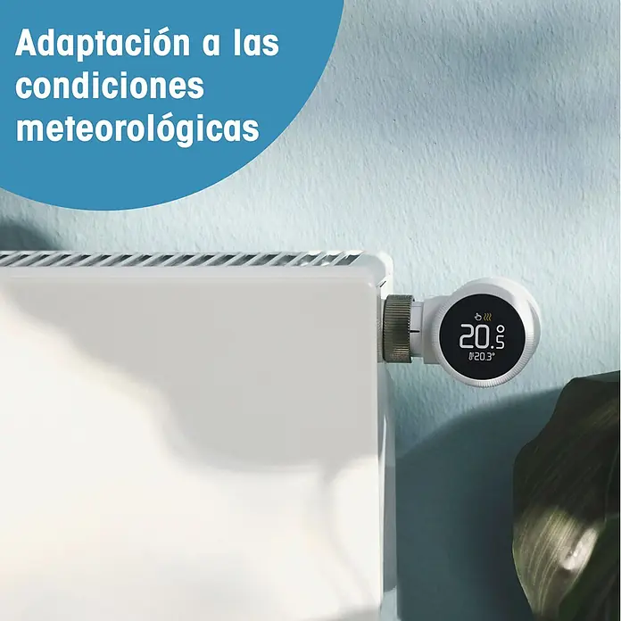 Tado Juego de termostato Bridge X + Cabezal Termoestático X - Blanco, Cabezal y Bridge - Válvula termostática inteligente blanca en un radiador, mostrando la temperatura para la adaptación climática.