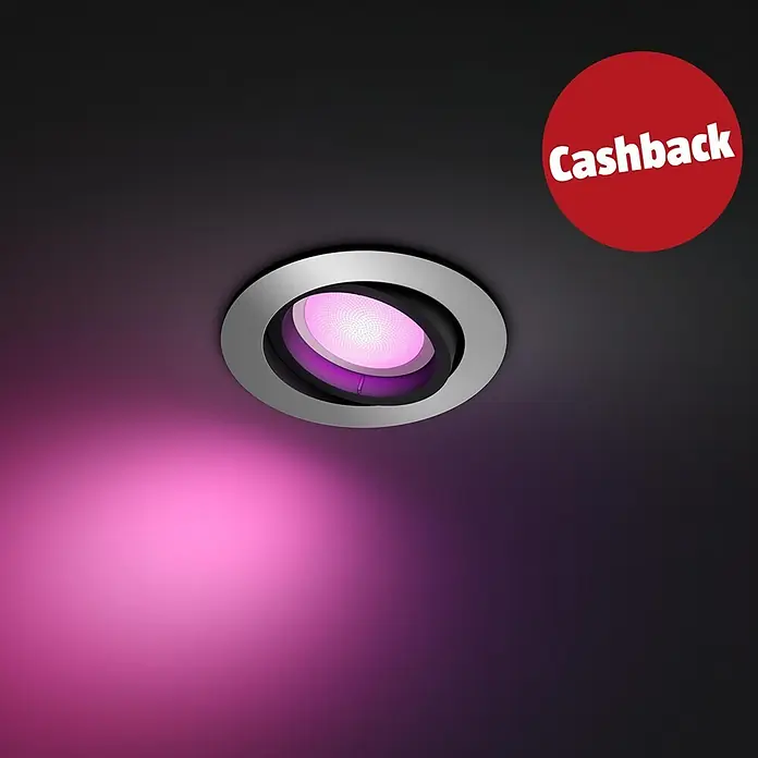 Philips Hue LED-Einbauspot White & Color Ambiance Centura - RGBW, Durchmesser: 9 cm, Farbe Gehäuse: Alu - Gebürsteter Metall-Einbaustrahler, der ein lebhaftes violettes Licht nach unten in eine dunkle Decke abstrahlt, mit einem roten 'Cashback'-Aufkleber.