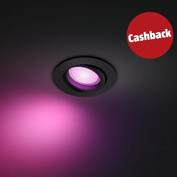 Philips Hue LED-Einbauspot White & Color Ambiance Centura - RGBW, Durchmesser: 9 cm, Farbe Gehäuse: Schwarz - Schwarzer Einbaustrahler, der rosa leuchtet, mit einem roten „Cashback“-Aufkleber.