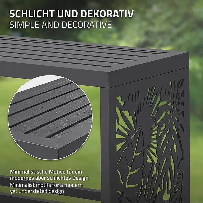 Kaminholzbank Innen/Aussen  120 cm aus Metall -  - Dunkelgraues Outdoor-Möbel mit Lattenoberfläche und dekorativer Seitenwand mit Blattausschnitten. Detailaufnahme zeigt strukturierte Oberfläche.