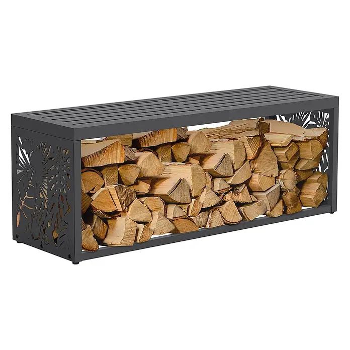 Kaminholzbank Innen/Aussen  120 cm aus Metall -  - Anthrazitfarbenes Metall-Kaminholzregal mit Blattausschnitten, gefüllt mit Holzscheiten.