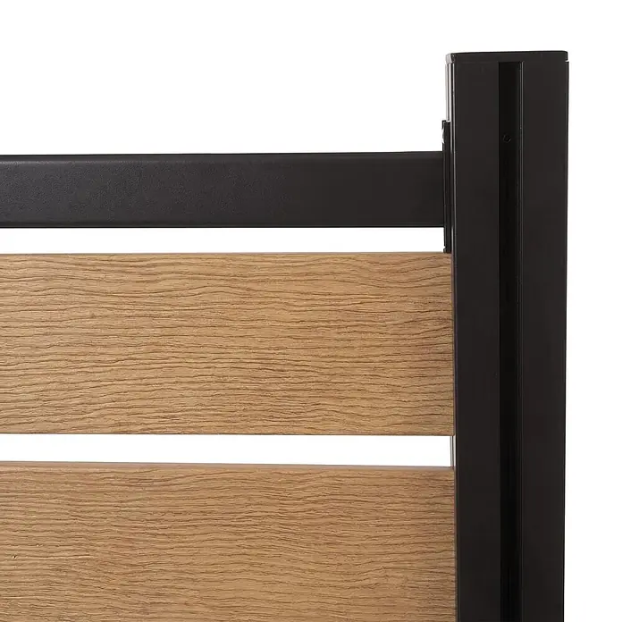 Alu Mülltonnen-Zaun 130x300x110cm Hellbraun Holzoptik erweiterbar -  - Detail eines Bettrahmens/Kopfteils mit dunklem Metall und hellen Holzlatten.