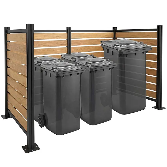 Alu Mülltonnen-Zaun 130x100x6cm Hellbraun Holzoptik erweiterbar -  - Mülltonnenbox aus Holzlatten und schwarzem Metallrahmen, mit vier dunkelgrauen Rollmülltonnen.