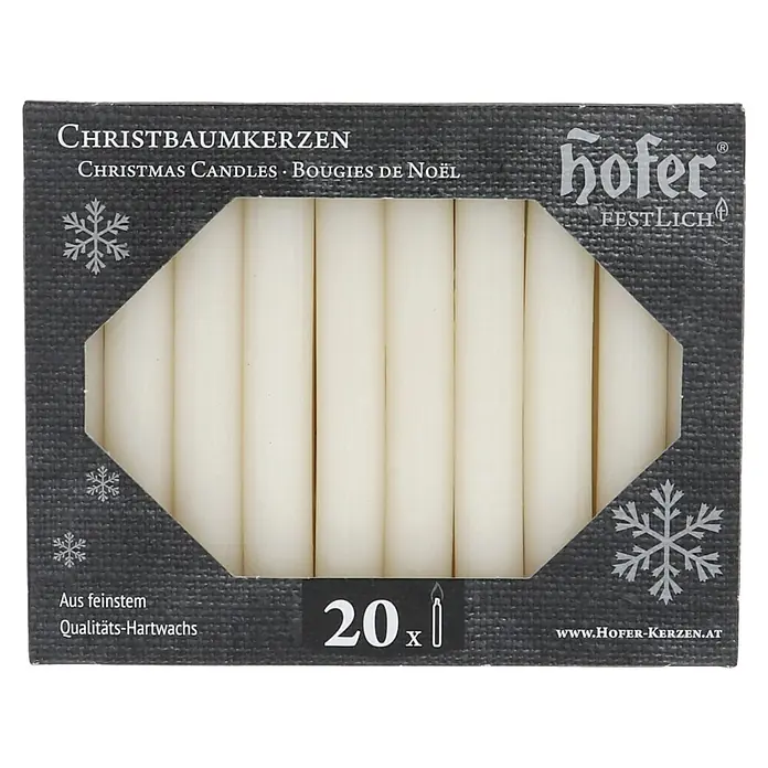 Hofer Christbaumkerze - 1,4 x 9,5 cm, Champagner, 20 Stk. - Dunkle Schachtel mit 20 cremefarbenen Christbaumkerzen aus Hartwachs, sichtbar durch ein Fenster.