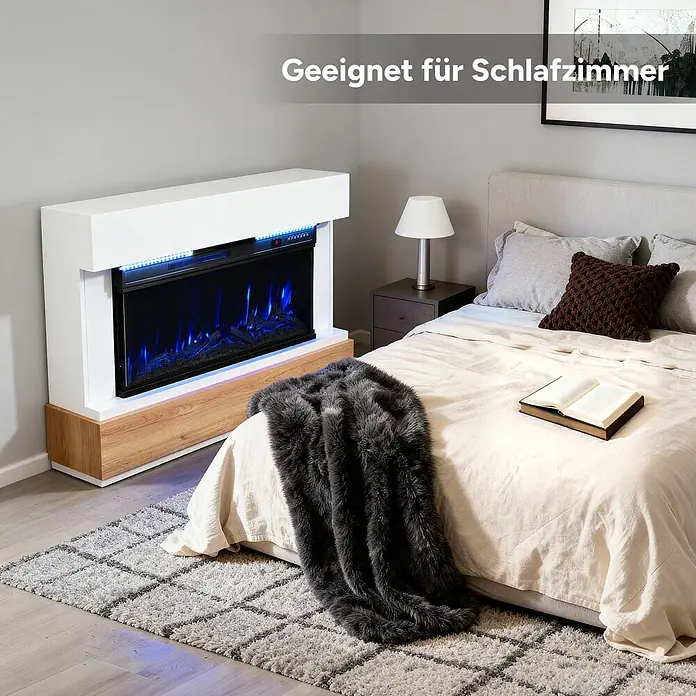 HOMAVO 36'' 1000W/2000W Elektrokamin mit Schrank -  - Elektrischer Kamin in Weiß-Holz-Optik mit blauen Flammen in einem modernen Schlafzimmer.
