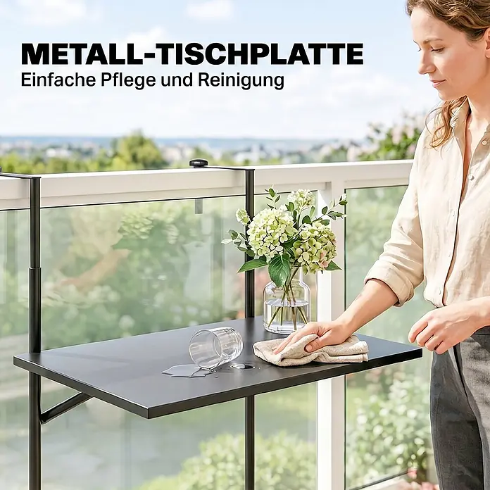 Furnicato Beistelltisch aus Stahl, schwarz, klappbar -  - Schwarzer Metall-Balkontisch, an Geländer montiert, wird von einer Frau gereinigt. Zeigt einfache Pflege und Reinigung.