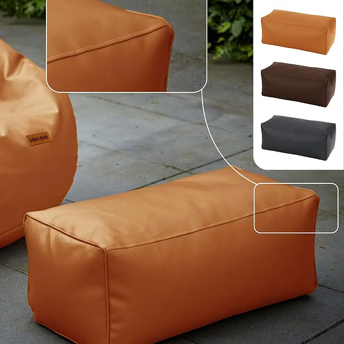 Green Bean Sitzhocker Cube Max Kunstleder 70x33x28 cm Cognac -  - Orange rechteckiger Outdoor-Pouf aus texturiertem Stoff mit sichtbaren Nähten, auf einer Terrasse gezeigt.