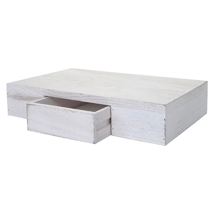 Wandregal Ilse 8x40x25cm Regal Hängeregal mit Schublade 40cm Weiß shabby -  - Couchtisch aus weiß gekälktem Holz mit teilweise geöffneter Schublade, der sein rustikales Finish zeigt.