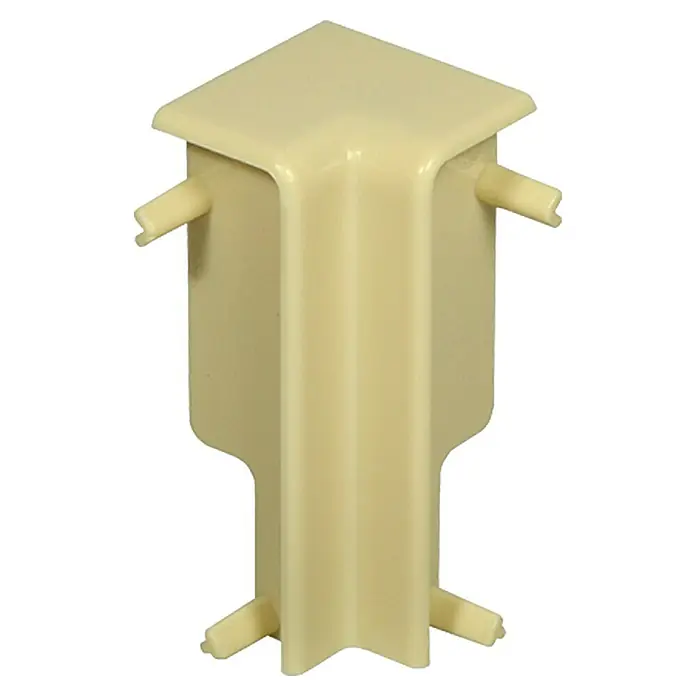 Profiles and more Innenecke FU51L/KU51L - Elfenbein, 2 Stk. - Nahaufnahme einer hellbeigen Eckabdeckung aus Kunststoff mit Befestigungsstiften, ideal zum Abdecken von Ecken.