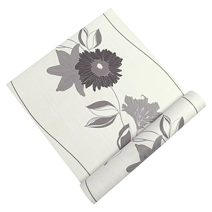 Daniel Hechter Vliestapete 2 - Beige/Braun/Metallic, Floral, 10,05 x 0,53 m - Nahaufnahme einer Rolle floral gemusterter Tapete, die eine elegante und stilvolle Dekoration für jeden Raum darstellt.