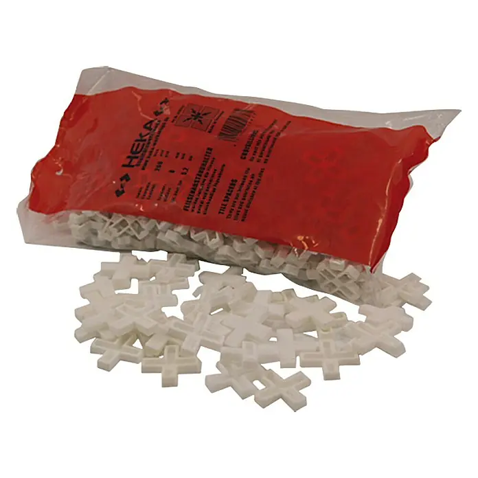 Heka Cruceta para baldosas - 200 ud., Ancho: 2 mm - Separadores de azulejos blancos en un paquete rojo. Los separadores aseguran un espaciado uniforme al colocar azulejos.