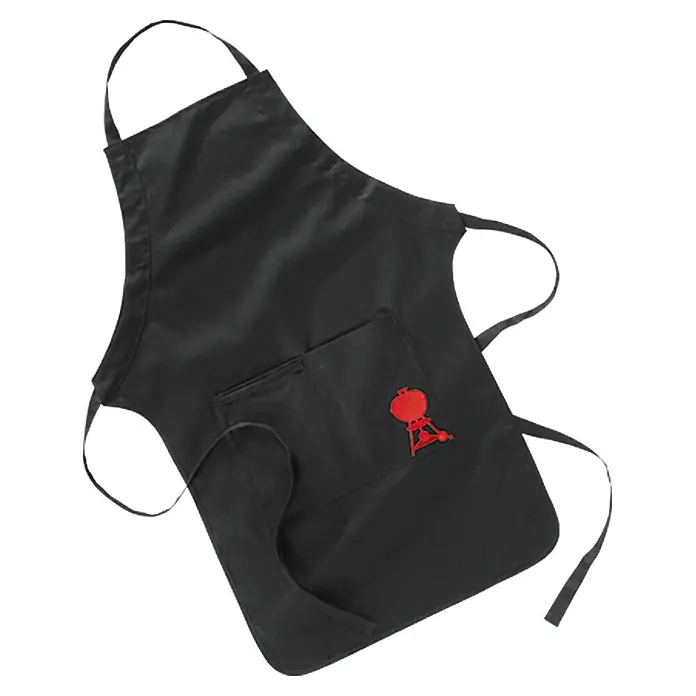 Weber Delantal para barbacoa - Textil, Negro - Delantal negro de barbacoa con un logotipo de parrilla rojo y un bolsillo práctico, ideal para todo maestro de la parrilla.