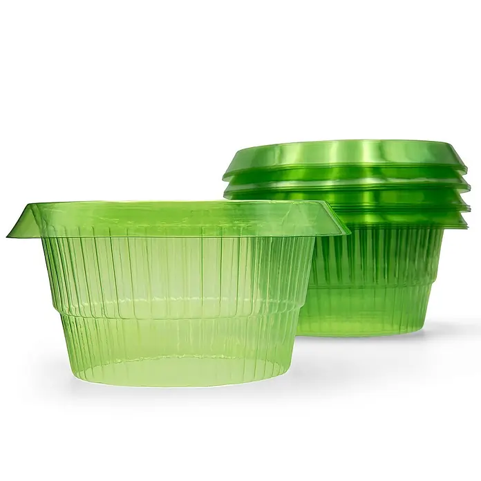 BigDean Luftentfeuchter-Nachfüllpack 6 Stk., 450 g -  - Ein transparenter grüner Kunststoffbehälter vorn und ein Stapel von drei ähnlichen Behältern dahinter, alle mit gerippten Seiten.