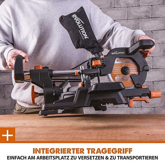 Evolution R210SMS-300+ Schiebe-Kapp- und Gehrungssäge 210 mm, TCT-Blatt -  - Person trägt eine schwarz-orange Evolution Gehrungssäge am integrierten Tragegriff zum Transport.